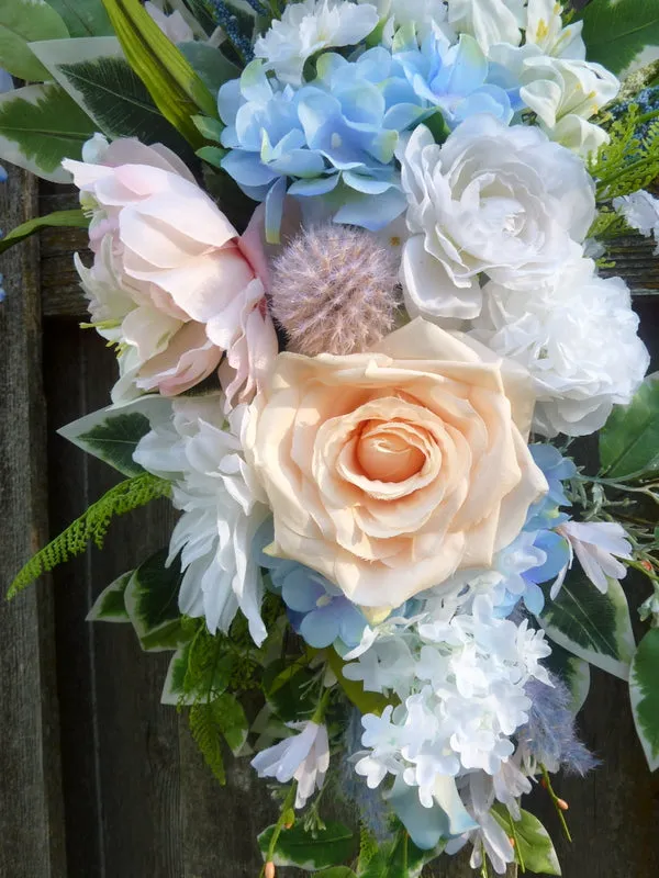 Peach and Blue Wedding Arch Flowers